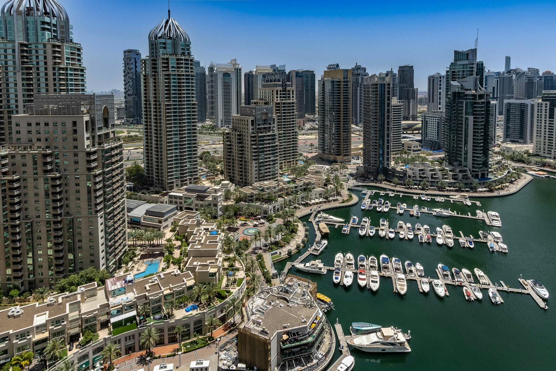 dubai marina skyline with high rise buildings and yachts